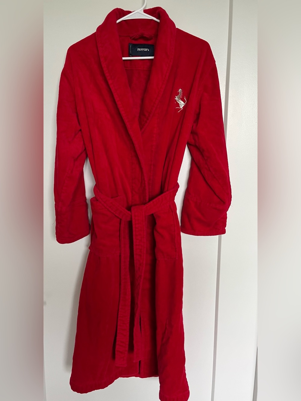 Ferrari Red Terry Cloth Garment with White Care Tag